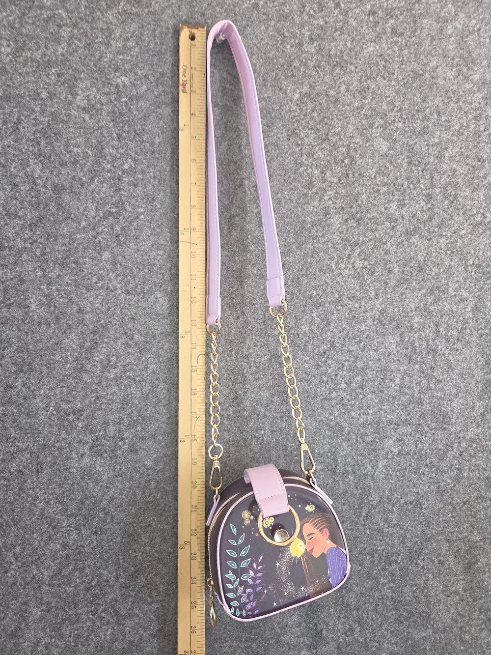 Enchanting crossbody bag features Asha from Disney's 'Wish' animated film,